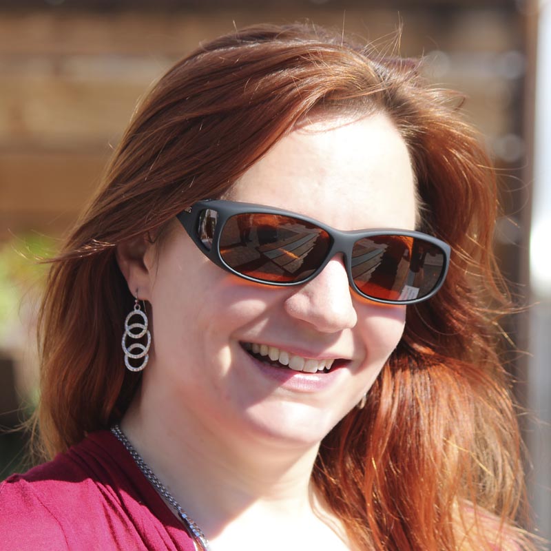 Anne B. wearing Cocoons Style Line MX Polarized Copper Fitover Sunglasses